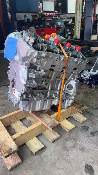 New engine ready for installation - engine replacement service at Dirty Dawgs Garage